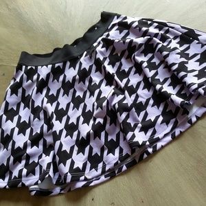 Lavender and black skirt.